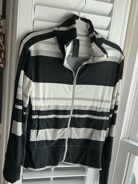 Norma Kamali black, white, and gray zip-up jacket. Size XS